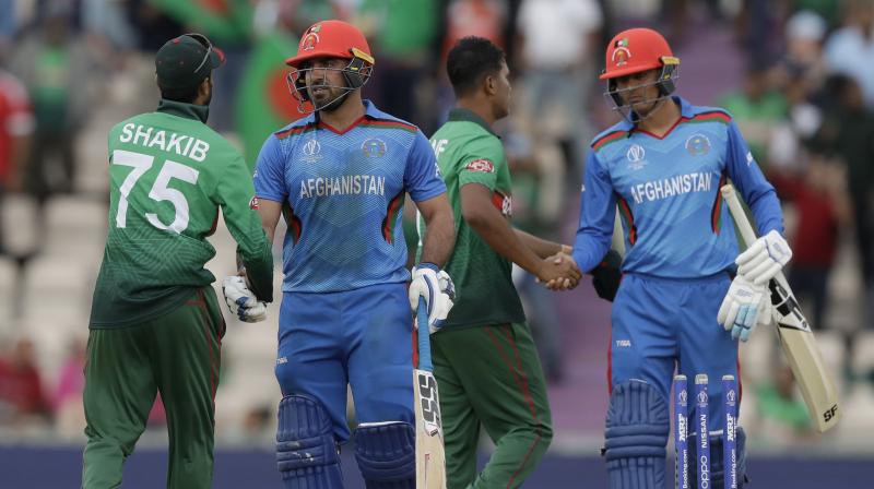 Experienced Mushfiqur joined Shakib and the duo mixed caution with aggression. Both the batsmen eased nerves in the Bangladesh dressing room as they put up a 61-run stand, which saw Shakib bringing up his fifty. This was Shakib's fifth fifty-plus score in this World Cup and as a result, he became the leading run-scorer in the ongoing World Cup with 476 runs. (Photo: AP) Experienced Mushfiqur joined Shakib and the duo mixed caution with aggression. Both the batsmen eased nerves in the Bangladesh dressing room as they put up a 61-run stand, which saw Shakib bringing up his fifty. This was Shakib's fifth fifty-plus score in this World Cup and as a result, he became the leading run-scorer in the ongoing World Cup with 476 runs. (Photo: AP)