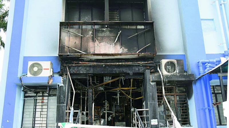 The ATM center which caught fire at Hanamkonda on Monday. (Photo: DC) The ATM center which caught fire at Hanamkonda on Monday. (Photo: DC)