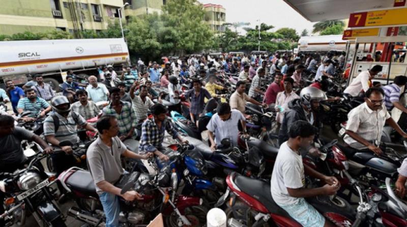 Long queues of two-wheelers were seen at petrol pumps on Thursday as a majority of people got their tanks full and extended their greetings to Raj Thackeray who turns 50 today. (Representational image | PTI) Long queues of two-wheelers were seen at petrol pumps on Thursday as a majority of people got their tanks full and extended their greetings to Raj Thackeray who turns 50 today. (Representational image | PTI)