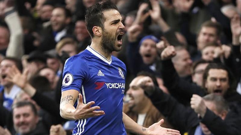 Cesc Fabregas made sure Chelsea capitalised on Tottenham Hotspur's 1-0 defeat at West Ham United on Friday by setting up goals for Diego Costa and Nemanja Matic. (Photo: AP) Cesc Fabregas made sure Chelsea capitalised on Tottenham Hotspur's 1-0 defeat at West Ham United on Friday by setting up goals for Diego Costa and Nemanja Matic. (Photo: AP)