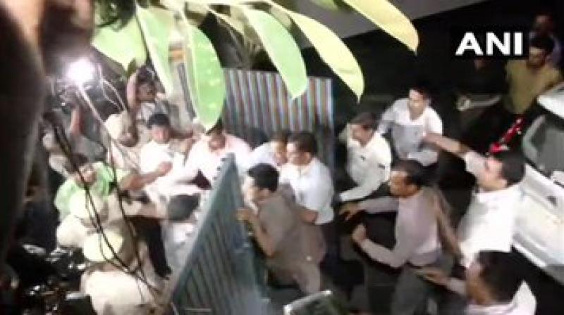 CBI officials jump over the wall of Chidambaram's residence in Jor Bagh to get into his home. (Photo: ANI) CBI officials jump over the wall of Chidambaram's residence in Jor Bagh to get into his home. (Photo: ANI)