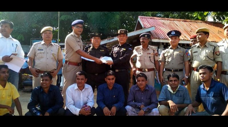 Assam Police hands over the 7 Rohingyas to Myanmar authorities after deportation formalities were completed. (Photo: Twitter | ANI) Assam Police hands over the 7 Rohingyas to Myanmar authorities after deportation formalities were completed. (Photo: Twitter | ANI)