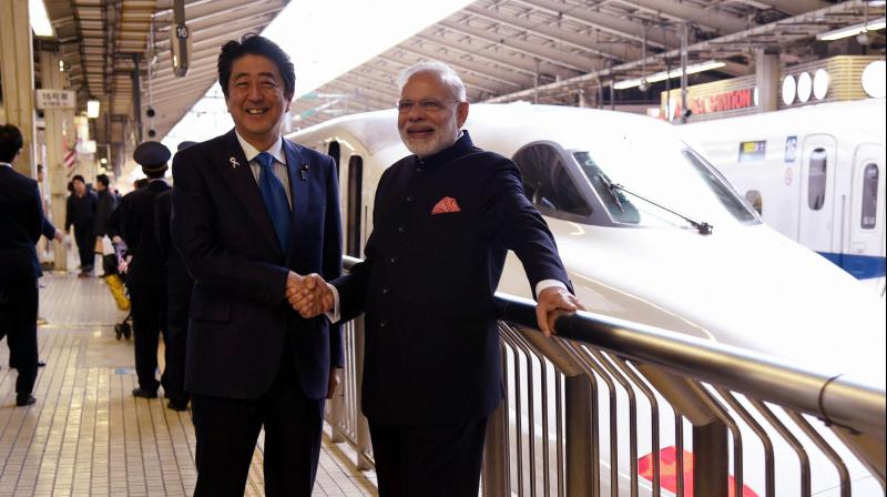 Japan’s Prime Minister Shinzo Abe laid the foundation stone for India’s first bullet train in September, 2017. It will link Mumbai with Ahmedabad, the largest commercial city in Indian Prime Minister Narendra Modi’s home state Gujarat. (Photo: PTI) Japan’s Prime Minister Shinzo Abe laid the foundation stone for India’s first bullet train in September, 2017. It will link Mumbai with Ahmedabad, the largest commercial city in Indian Prime Minister Narendra Modi’s home state Gujarat. (Photo: PTI)
