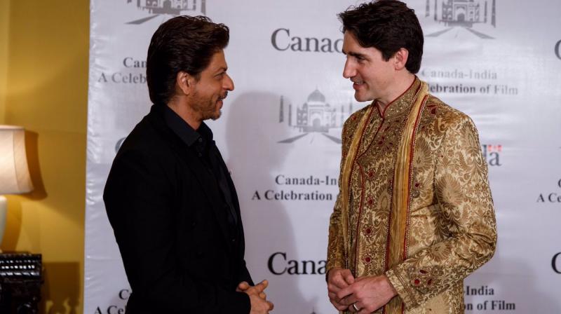 Shah Rukh Khan with Canadian Prime Minister Justin Trudeau. Shah Rukh Khan with Canadian Prime Minister Justin Trudeau.