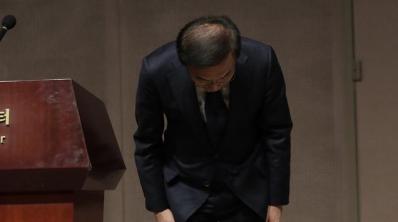 The standoff began in 2007 when taxi driver Hwang Sang-gi refused to accept a settlement after his 23-year-old daughter died of leukemia after working at a Samsung factory. (Photo: AP) The standoff began in 2007 when taxi driver Hwang Sang-gi refused to accept a settlement after his 23-year-old daughter died of leukemia after working at a Samsung factory. (Photo: AP)