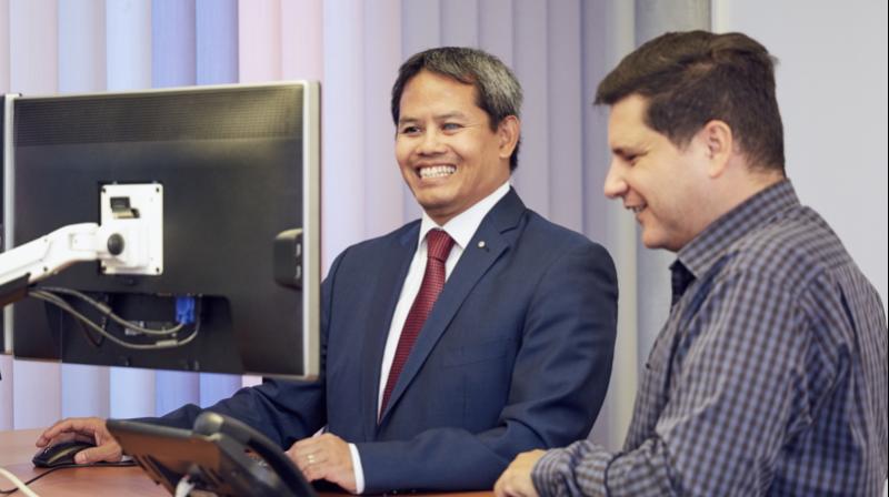 Kannarath Meystre and Luciano Butera demonstrate the use of screen readers, which greatly improved access to technology for those with visual impairments. Kannarath Meystre and Luciano Butera demonstrate the use of screen readers, which greatly improved access to technology for those with visual impairments.