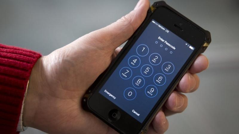 Officers are allowed under law to look through devices of travellers who are referred for a secondary inspection. (Photo: AP) Officers are allowed under law to look through devices of travellers who are referred for a secondary inspection. (Photo: AP)