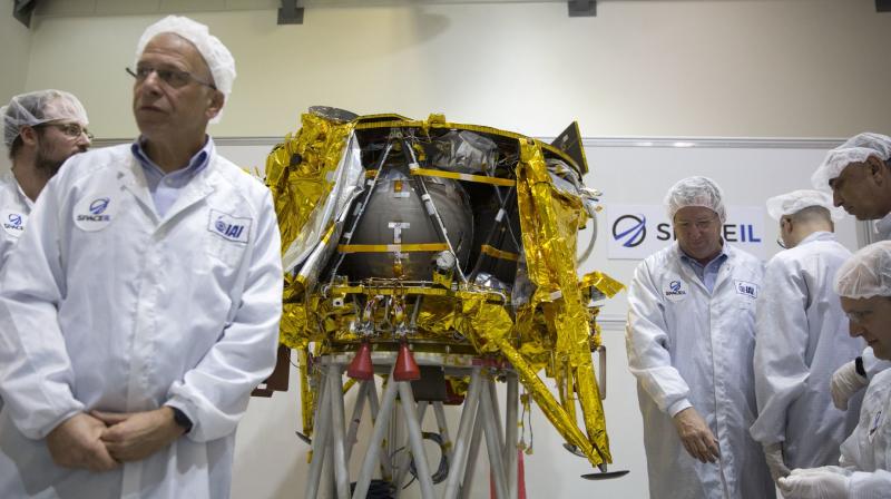 Israel Aerospace Industries manager Opher Doron stressed that the small craft, roughly the size of a washing machine, faces a “difficult, arduous journey.” (Photo: AP) Israel Aerospace Industries manager Opher Doron stressed that the small craft, roughly the size of a washing machine, faces a “difficult, arduous journey.” (Photo: AP)
