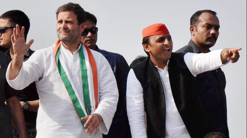 Congress Vice President Rahul Gandhi (Right) and Samajwadi Party leader Akhilesh Yadav (Left) (Photo: PTI) Congress Vice President Rahul Gandhi (Right) and Samajwadi Party leader Akhilesh Yadav (Left) (Photo: PTI)