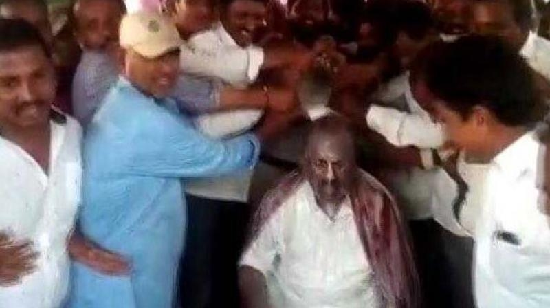 Telangana Assembly Speaker Sirikonda Madhusudhana Chary gets a 'VVIP milk bath' from his supporters. (ANI | Screengrab) Telangana Assembly Speaker Sirikonda Madhusudhana Chary gets a 'VVIP milk bath' from his supporters. (ANI | Screengrab)
