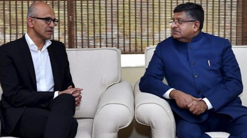 Union Minister for Electronics & Information Technology Ravi Shankar Prasad with CEO Microsoft, Satya Narayana Nadella during a meeting in New Delhi (Photo:PTI) Union Minister for Electronics & Information Technology Ravi Shankar Prasad with CEO Microsoft, Satya Narayana Nadella during a meeting in New Delhi (Photo:PTI)