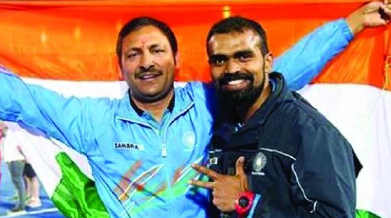 Coach Harendra Singh (left) and captain P. R. Sreejesh. Coach Harendra Singh (left) and captain P. R. Sreejesh.