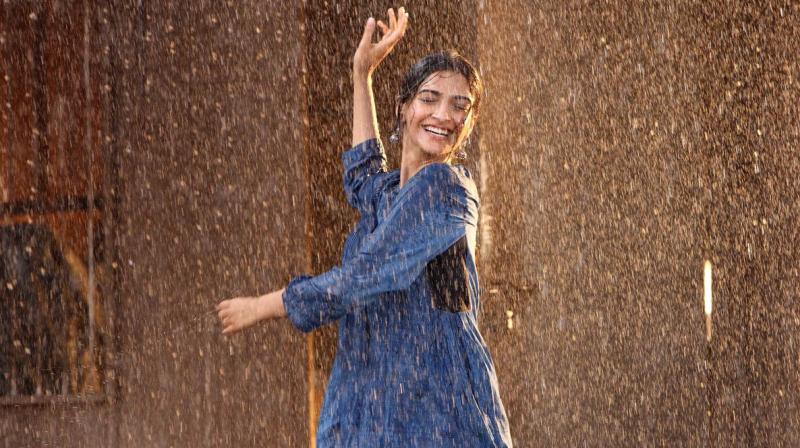 Sonam Kapoor shares a photo of her dancing in the rains. Sonam Kapoor shares a photo of her dancing in the rains.