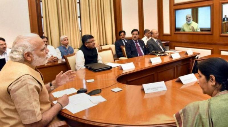 Cabinet reshuffle and expansion will be held on Sunday ahead of Prime Minister Narendra Modi's visit to Beijing for the BRICS summit. (Photo: PTI/File) Cabinet reshuffle and expansion will be held on Sunday ahead of Prime Minister Narendra Modi's visit to Beijing for the BRICS summit. (Photo: PTI/File)
