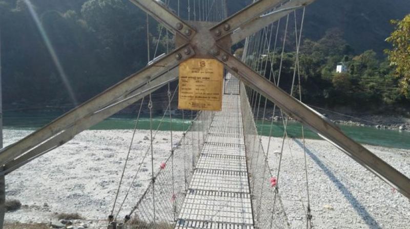 Constructed over the Mahakali River at the Lekam Rural Municipality in Nepal's Darchula district, the bridge (commonly known as Lali Bridge) would provide connectivity with the Pithoragarh town on the Indian side. (Photo: ANI) Constructed over the Mahakali River at the Lekam Rural Municipality in Nepal's Darchula district, the bridge (commonly known as Lali Bridge) would provide connectivity with the Pithoragarh town on the Indian side. (Photo: ANI)