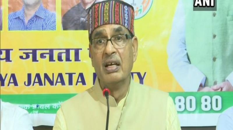 'Congress is falling apart. Madam (Sonia Gandhi) and Rahul Gandhi haven't said anything till date. I demand that Sonia ji should clear Congress' viewpoint in the matter (Article 370),' Chouhan said. (Photo: ANI) 'Congress is falling apart. Madam (Sonia Gandhi) and Rahul Gandhi haven't said anything till date. I demand that Sonia ji should clear Congress' viewpoint in the matter (Article 370),' Chouhan said. (Photo: ANI)