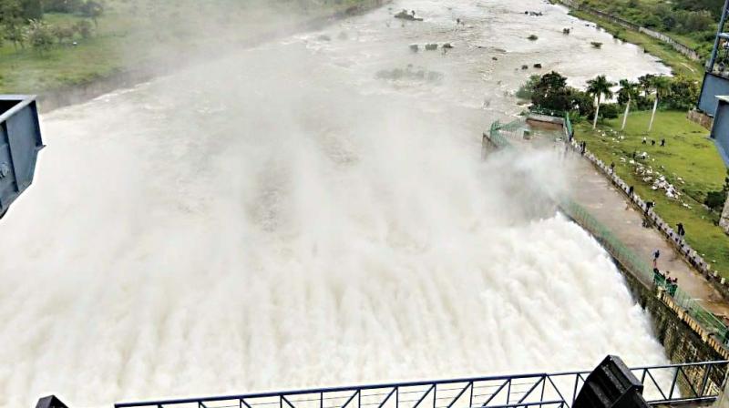 Water being released from Hemavathy Dam in Hassan on Saturday. Water being released from Hemavathy Dam in Hassan on Saturday.