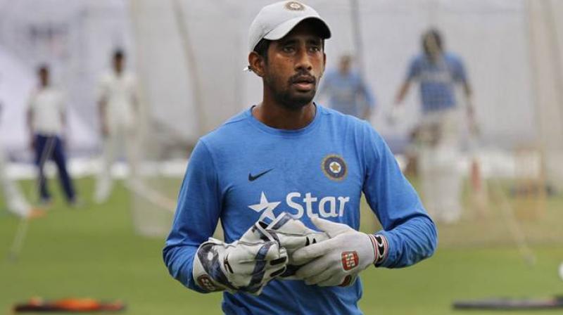 The Australia Test series begins in December 6, which may be a realistic chance of Saha's comeback plans. (Photo: AP) The Australia Test series begins in December 6, which may be a realistic chance of Saha's comeback plans. (Photo: AP)