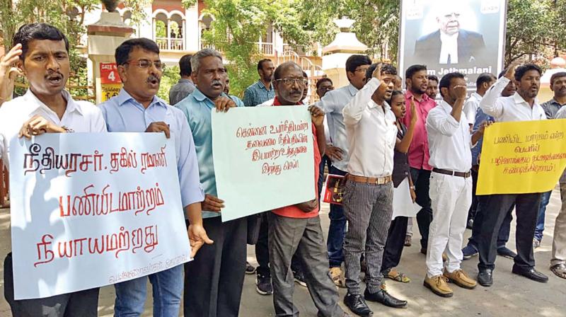 Lawyers protest in front of Coimbatore court complex. Lawyers protest in front of Coimbatore court complex.