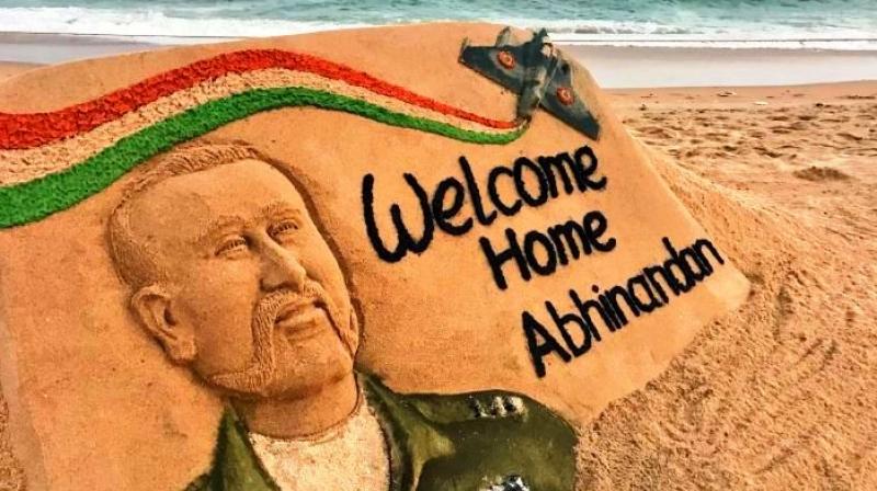 Sudarsan Pattnaik's latest creation for IAF Wng Cmdr Abhinandan Varthaman. (Photo: ANI) Sudarsan Pattnaik's latest creation for IAF Wng Cmdr Abhinandan Varthaman. (Photo: ANI)