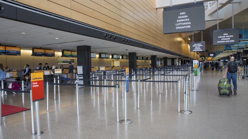Check-in gates are quiet at SeattleTacoma International Airport due to travel restrictions worldwide on account of the coronavirus scare. (AFP)is seeing a global slowdown as a result of fears over the novel coronavirus, COVID-19. Check-in gates are quiet at SeattleTacoma International Airport due to travel restrictions worldwide on account of the coronavirus scare. (AFP)is seeing a global slowdown as a result of fears over the novel coronavirus, COVID-19.