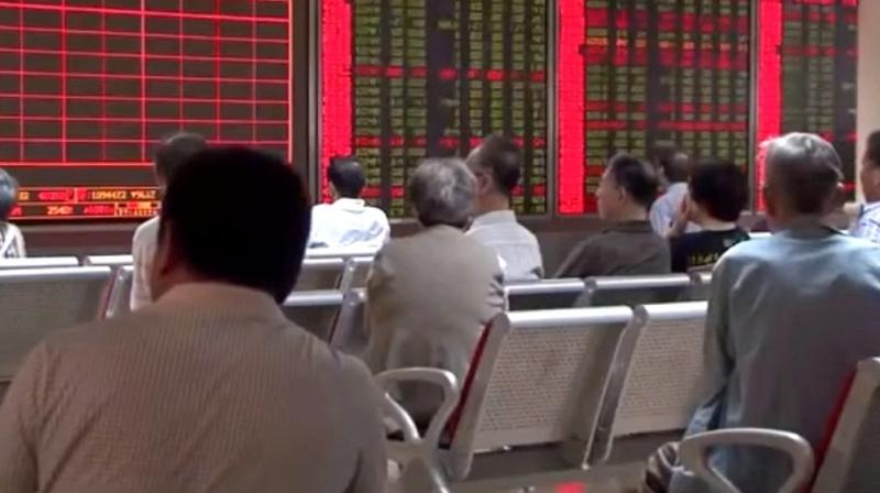 Japan's Nikkei was flat after weaving in and out of the red. It looked set for a 0.3 per cent weekly loss as investors braced for upcoming earnings reports. Japan's Nikkei was flat after weaving in and out of the red. It looked set for a 0.3 per cent weekly loss as investors braced for upcoming earnings reports.