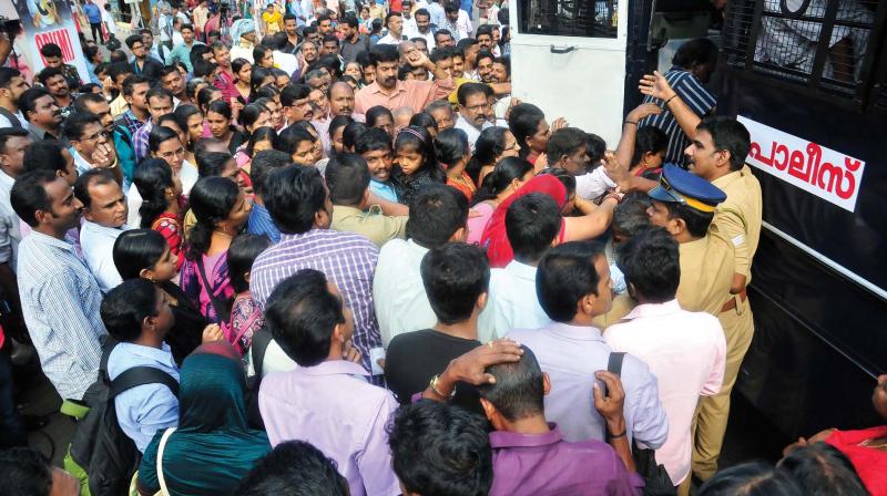 Police vans take passengers in front of Central Railway Station due to the motor vehicle bandh called by major trade unions against increase in price of diesel and petrol, in Thiruvananthapuram on Wednesday. (Photo: A.V. MUZAFAR) Police vans take passengers in front of Central Railway Station due to the motor vehicle bandh called by major trade unions against increase in price of diesel and petrol, in Thiruvananthapuram on Wednesday. (Photo: A.V. MUZAFAR)