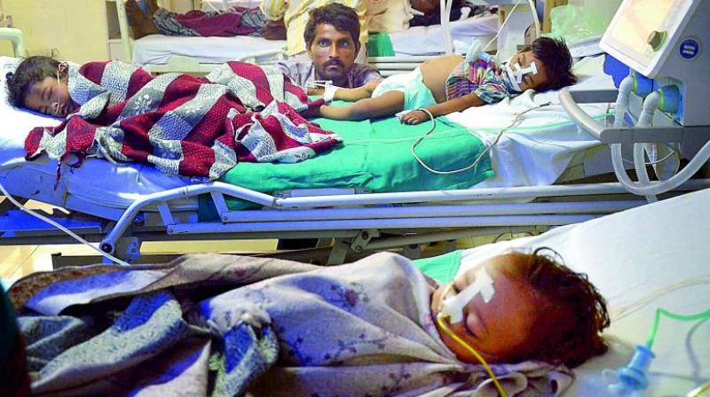 Children admitted in the state-run Baba Raghav Das Medical College in Gorakhpur. (Photo; PTI | File) Children admitted in the state-run Baba Raghav Das Medical College in Gorakhpur. (Photo; PTI | File)