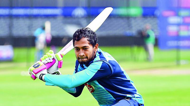 Mushfiqur Rahim of Bangladesh plays a shot during a training session at Bristol County Ground on Monday. (Photo:AFP) Mushfiqur Rahim of Bangladesh plays a shot during a training session at Bristol County Ground on Monday. (Photo:AFP)