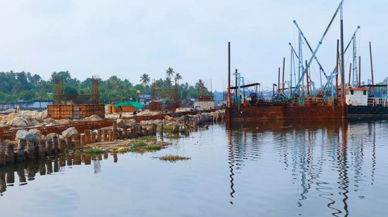 Link road works under progress by filling Ashtamudi Lake. Link road works under progress by filling Ashtamudi Lake.
