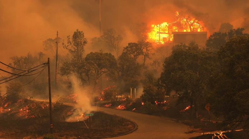 A home burns as the LNU Lightning Complex Fire burns through the area on August 18, 2020 in Napa, California. (AFP) A home burns as the LNU Lightning Complex Fire burns through the area on August 18, 2020 in Napa, California. (AFP)