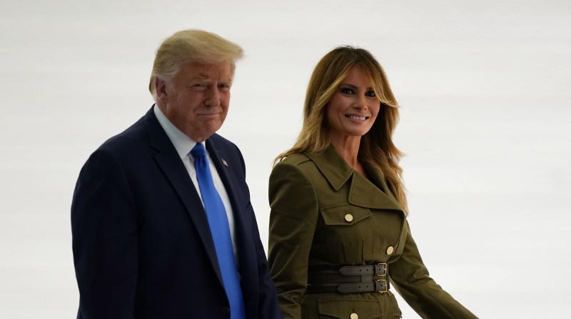 President Donald Trump leaves with first lady Melania Trump after her speech to the 2020 Republican National Convention from the Rose Garden of the White House. (AP) President Donald Trump leaves with first lady Melania Trump after her speech to the 2020 Republican National Convention from the Rose Garden of the White House. (AP)