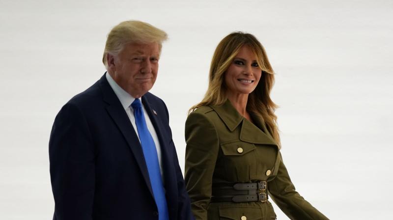 President Donald Trump leaves with first lady Melania Trump after her speech to the 2020 Republican National Convention from the Rose Garden of the White House. (AP)