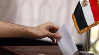 The balloting was held amid the coronavirus pandemic, but the commission said it took all necessary measures so voters could cast their ballots. (AFP)