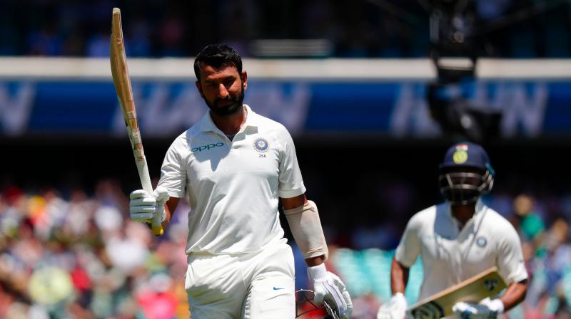 Cheteshwar Pujara has gained a spot to be third in the latest ICC batsmen rankings, following his man of the series performance in India's maiden Test series win in Australia. (Photo: AFP) Cheteshwar Pujara has gained a spot to be third in the latest ICC batsmen rankings, following his man of the series performance in India's maiden Test series win in Australia. (Photo: AFP)