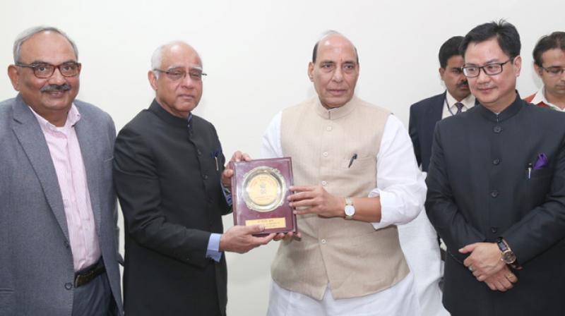 The Union Home Minister, Shri Rajnath Singh presenting a memento to Shri Rajinder Khanna, who retired as the Secretary (R) on December 31, 2016, at a function, in New Delhi on January 01, 2017. (Photo: PIB) The Union Home Minister, Shri Rajnath Singh presenting a memento to Shri Rajinder Khanna, who retired as the Secretary (R) on December 31, 2016, at a function, in New Delhi on January 01, 2017. (Photo: PIB)