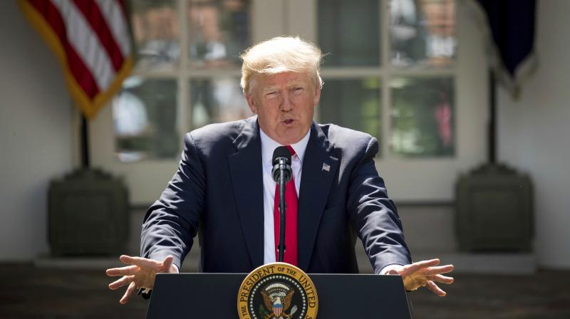 US President Donald Trump speaks about the U.S. role in the Paris climate change accord. (Photo: AP) US President Donald Trump speaks about the U.S. role in the Paris climate change accord. (Photo: AP)