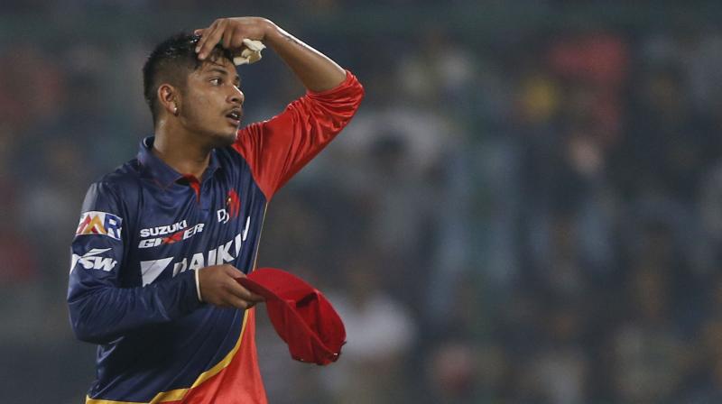 Sandeep Lamichhane, aged 17 and the first Nepalese player to land an IPL contract, took one wicket for 25 from his four overs opening the attack with his leg-spin for Delhi Daredevils against Royal Challengers Bangalore. (Photo: AP) Sandeep Lamichhane, aged 17 and the first Nepalese player to land an IPL contract, took one wicket for 25 from his four overs opening the attack with his leg-spin for Delhi Daredevils against Royal Challengers Bangalore. (Photo: AP)