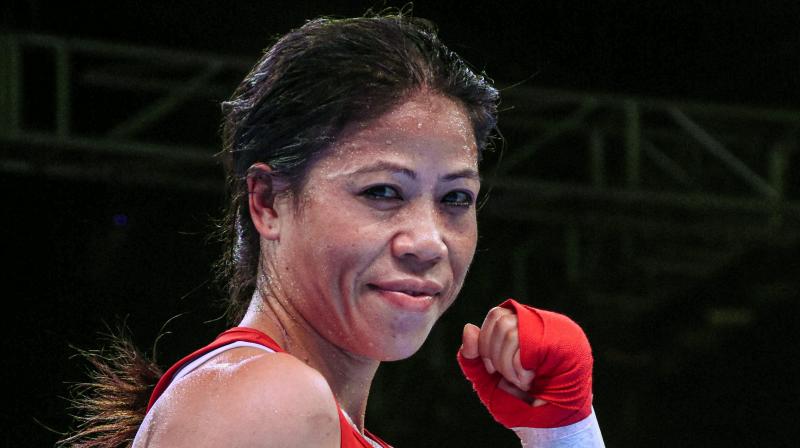 Mary Kom, a six-time world champion and an Olympic bronze-medallist, was chosen by the BFI selection panel based on her gold medal-winning performances at the India Open and a subsequent tournament in Indonesia. (Photo:PTI) Mary Kom, a six-time world champion and an Olympic bronze-medallist, was chosen by the BFI selection panel based on her gold medal-winning performances at the India Open and a subsequent tournament in Indonesia. (Photo:PTI)