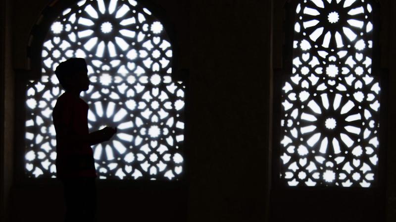An Acehnese boy recites the Koran at a mosque on the first day of the Muslim holy fasting month of Ramadan in Banda Aceh on May 17, 2018. (Photo: AFP) An Acehnese boy recites the Koran at a mosque on the first day of the Muslim holy fasting month of Ramadan in Banda Aceh on May 17, 2018. (Photo: AFP)