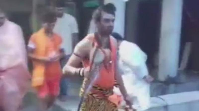 'Will pray for the welfare of the people of Bihar and the entire nation so that everybody lives in peace, in harmony, without any divide or barrier. I will also pray for the health of my father, will pray for his long life,' Tej Pratap Yadav said. (Photo: Twitter | ANI) 'Will pray for the welfare of the people of Bihar and the entire nation so that everybody lives in peace, in harmony, without any divide or barrier. I will also pray for the health of my father, will pray for his long life,' Tej Pratap Yadav said. (Photo: Twitter | ANI)