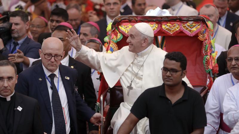 Francis arrived in Dhaka on Thursday from Myanmar, where he walked a diplomatic tightrope, publicly avoiding allegations that the army is waging an ethnic cleansing campaign against the Rohingya. (Photo: AP) Francis arrived in Dhaka on Thursday from Myanmar, where he walked a diplomatic tightrope, publicly avoiding allegations that the army is waging an ethnic cleansing campaign against the Rohingya. (Photo: AP)