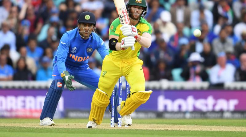 Australia opener David Warner became the fifth batsman at the World Cup to get an unexpected reprieve after he dragged a ball on to his stump but the impact failed to dislodge the zing bails in Sunday’s match against India. (Photo:AFP) Australia opener David Warner became the fifth batsman at the World Cup to get an unexpected reprieve after he dragged a ball on to his stump but the impact failed to dislodge the zing bails in Sunday’s match against India. (Photo:AFP)