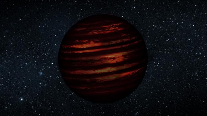 An artist’s conception of SIMP J013656.5+093347, or SIMP0136 for short, which the research team determined is a planetary like member of a 200-million-year-old group of stars called Carina-Near. Image is courtesy of NASA/JPL, slightly modified by Jonathan Gagné. An artist’s conception of SIMP J013656.5+093347, or SIMP0136 for short, which the research team determined is a planetary like member of a 200-million-year-old group of stars called Carina-Near. Image is courtesy of NASA/JPL, slightly modified by Jonathan Gagné.