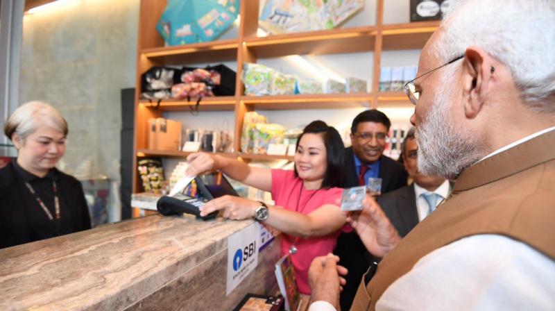 Through RuPay, users will be able to make payments at all NETS acceptance points across Singapore. (Photo: @narendramodi | Twitter) Through RuPay, users will be able to make payments at all NETS acceptance points across Singapore. (Photo: @narendramodi | Twitter)