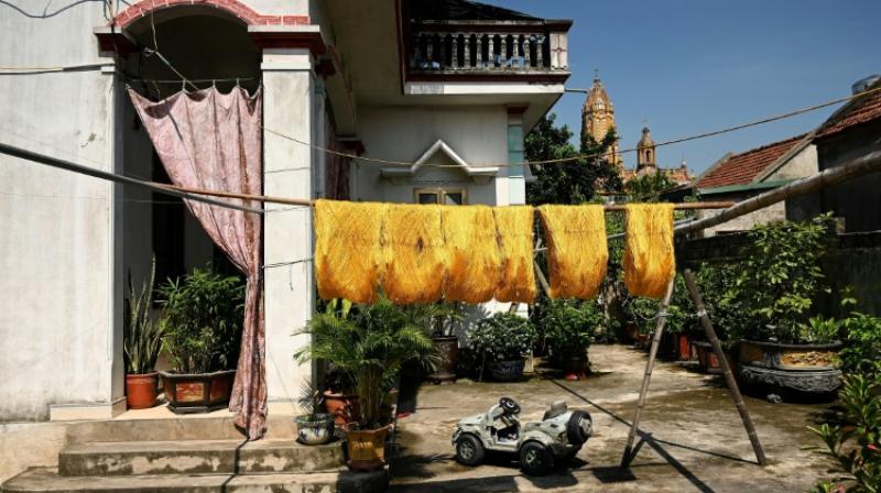 Doing it manually makes it easier to salvage usable silk thread from cocoons even if they are not good. (Photo: AFP) Doing it manually makes it easier to salvage usable silk thread from cocoons even if they are not good. (Photo: AFP)