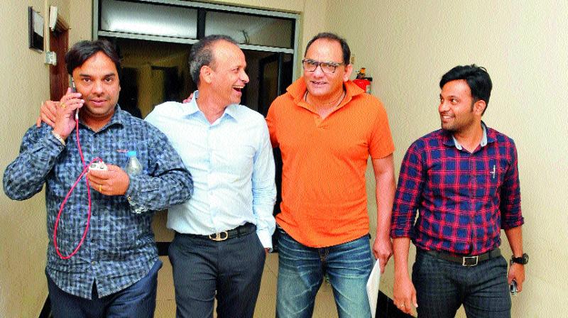 Presidential contestant Mohammad Azharuddin (second from right) shares a light moment with former HCA joint secretary Purshotham Agarwal (second from left) as treasurer candidate Surender Kumar Agarwal (left) and HCA staffer Mohammad Yousuf look on at the Rajiv Gandhi International Cricket Stadium in Uppal, Hyderabad. (Photo: DC) Presidential contestant Mohammad Azharuddin (second from right) shares a light moment with former HCA joint secretary Purshotham Agarwal (second from left) as treasurer candidate Surender Kumar Agarwal (left) and HCA staffer Mohammad Yousuf look on at the Rajiv Gandhi International Cricket Stadium in Uppal, Hyderabad. (Photo: DC)