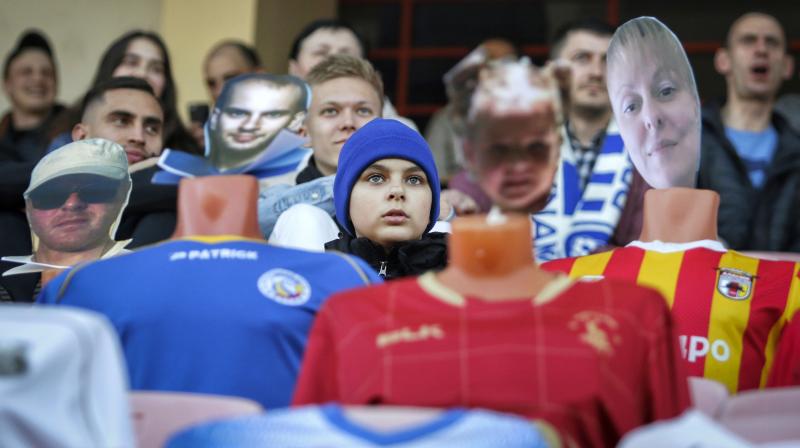 In this photo taken on Wednesday, April 8, 2020, spectators sit among the many mannequins in the stands during a soccer match between FC Dynamo Brest and FC Shakhter Soligorsk in Brest, Belarus. AP Photo