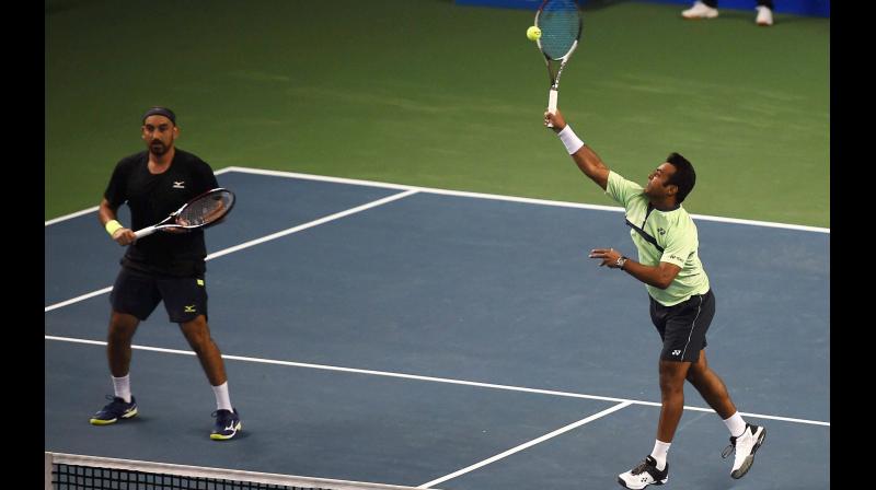 Doubles specialists Purav Raja and Leander Paes. PTI Photo