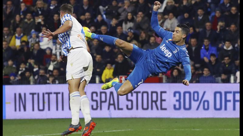 Juventus' Cristiano Ronaldo tries an acrobatic kick during an Italian Serie A match against Spal at the Paolo Mazza stadium in Ferrara, Italy. AP Photo Juventus' Cristiano Ronaldo tries an acrobatic kick during an Italian Serie A match against Spal at the Paolo Mazza stadium in Ferrara, Italy. AP Photo